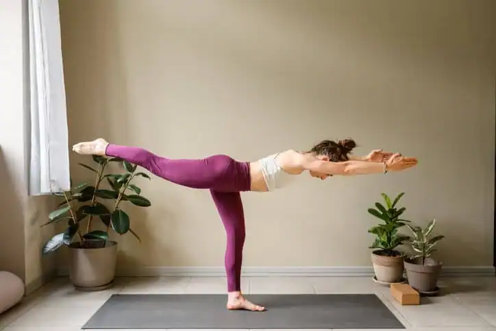 Achieving the Perfect Tone: How Often Should You Exercise for Results? 1 Woman doing Yoga exercise East Kilbride to help with toning the body.