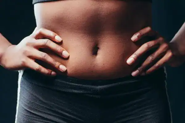 Toning Your Stomach: The Ultimate Guide to Achieving a Sculpted Stomach While Shedding Pounds 1 Image of a toned stomach after non surgical treatment East Kilbride
